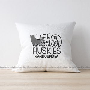 May include: White pillow with the text "Life is better with Huskies around" and a silhouette of a husky dog.