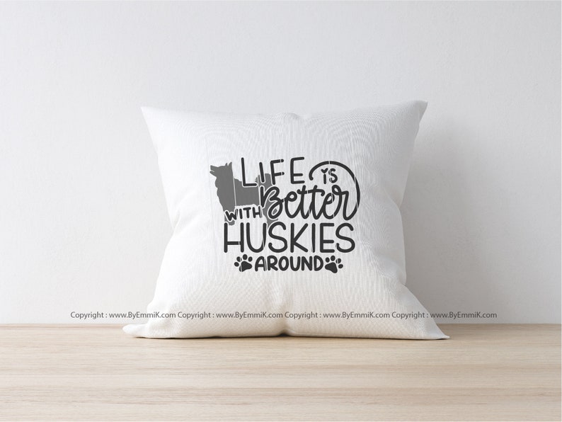 May include: White pillow with the text "Life is better with Huskies around" and a silhouette of a husky dog.