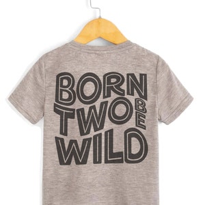 May include: A grey t-shirt with a black graphic that says "Born Two Be Wild" on the back.