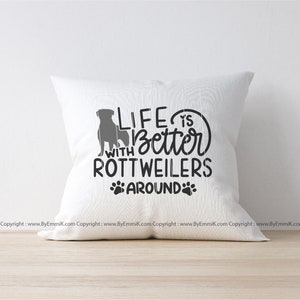 May include: White throw pillow with the text "Life is better with Rottweilers around" and a silhouette of a Rottweiler dog.