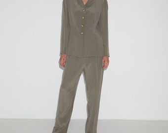 Vintage olive green silk suit with elegant blazer and relaxed tailored trouser