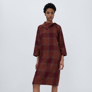 Vintage deep red check wool dress cut from wool with boat collar and finished with buttons