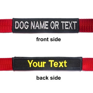 May include: Red dog collar with a black patch that says "DOG NAME OR TEXT" on the front and "Your Text" on the back.