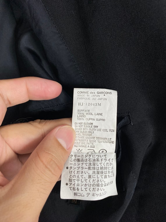 Comme des garçons traductor masculino hot sale