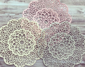 Pastel paper lace doilies