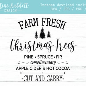 May include: Black and white sign with the text "FARM FRESH Christmas Trees" and "PINE SPRUCE FIR complimentary APPLE CIDER & HOT COCOA •CUT AND CARRY."