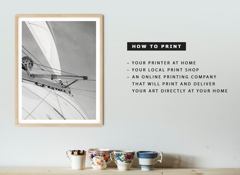 May include: A black and white photograph of a sailboat's rigging against a cloudy sky. The image is framed in a light wood frame. The text "HOW TO PRINT" is written in black text on a white background. The text below "HOW TO PRINT" lists different ways to print the image, including using a home printer, a local print shop, or an online printing company.