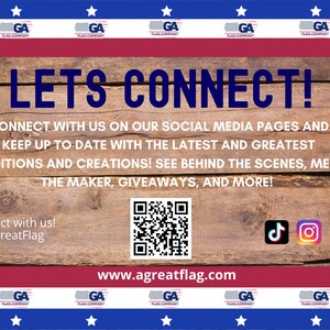 May include: A wooden sign with the text "LETS CONNECT!" and a QR code. The sign also includes the text "Connect with us! @AGreatFlag" and the website address "www.agreatflag.com". The sign is decorated with stars and the letters "GA" in a circle.