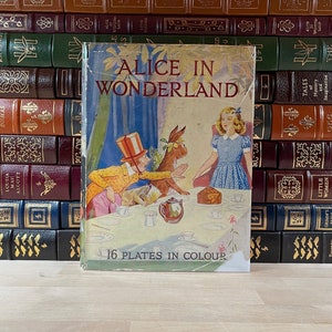 Frühe Ausgabe von 1900 von Alice's Abenteuer im Wunderland von Louis Carroll, schöne Farbillustrationen, sehr seltener DJ