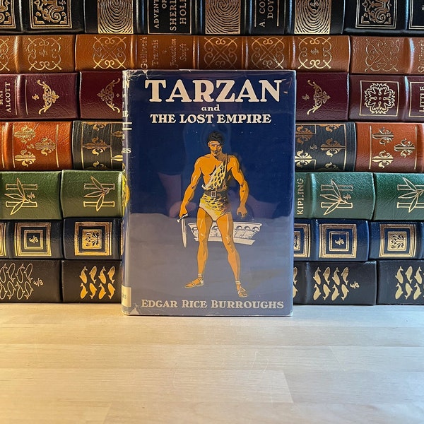 Tarzán y el imperio perdido por Edgar Rice Burroughs, Primera impresión, Publicado en 1948, Sobrecubierta original, Autor de John Carter