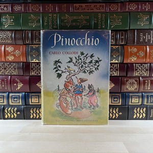 Pinocchio by C. Collodi, First J.B. Lippincott Edition, Nicely illustrated by Anne Heyneman, Rare DJ, 1948