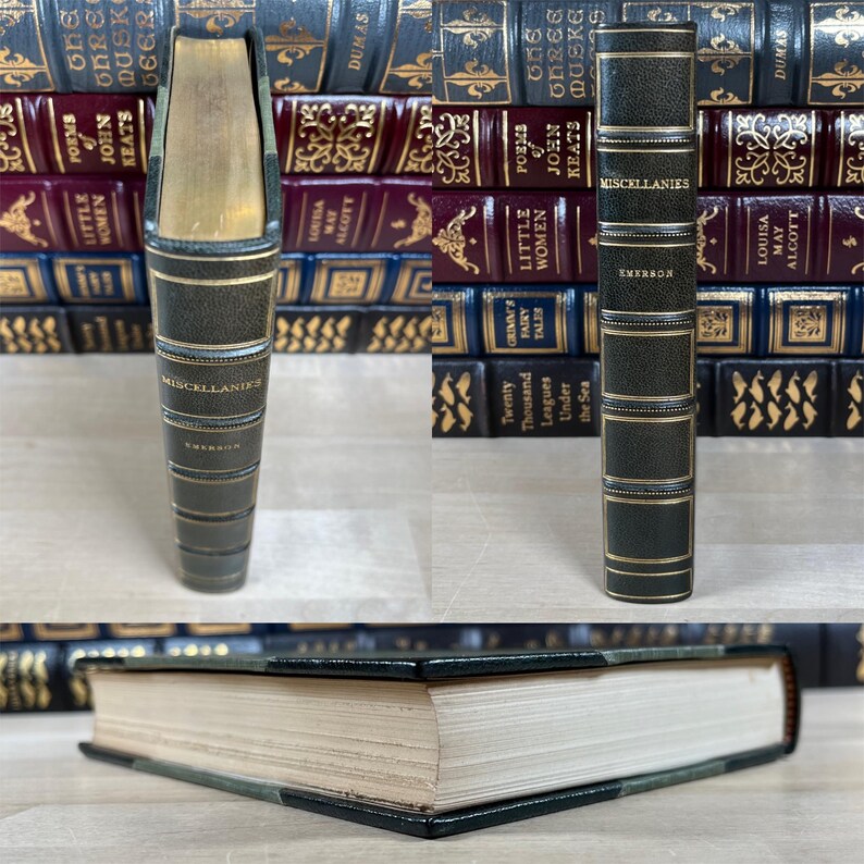 May include: A vintage book titled "Miscellanies" by Emerson. The book has a dark green cover with gold accents and text. The spine displays the title and author's name. The book is part of a collection of antique books with various colors and titles.