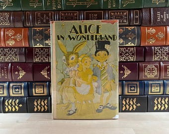 Alice in Wonderland & Through the Looking Glass by Lewis Carroll, Goldsmith Publishing, 1960s