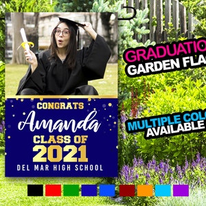 May include: A blue and gold graduation yard sign with the text "Congrats Amanda Class of 2021 Del Mar High School". The sign features a photo of a graduate in a cap and gown. The sign is available in multiple colors.