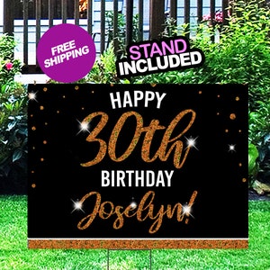 May include: Black and gold glitter Happy 30th Birthday yard sign with the name Jocelyn. The sign has a black background with gold glitter lettering and confetti. The sign is on a green lawn.
