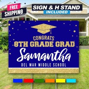 May include: Blue and gold graduation yard sign with the text "Congrats 8th Grade Grad Samantha Del Mar Middle School".