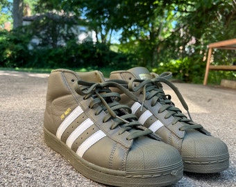 high top shell toe adidas mens