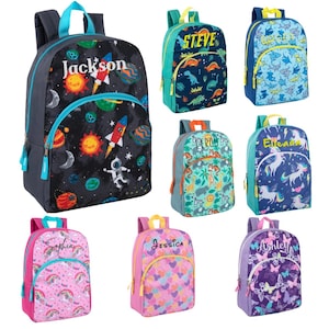 May include: A collection of personalized backpacks in various designs. One backpack features a space theme with the name "Jackson". Other designs include dinosaurs, sharks, jungle animals, unicorns, hearts, and butterflies. Each backpack has a name on it.
