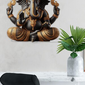May include: A black and gold statue of the Hindu deity Ganesha in a seated position. The statue features intricate detailing and is adorned with gold accents. The elephant-headed figure is a symbol of wisdom and prosperity.