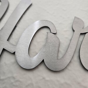 a metal sign that says raw metal diy color