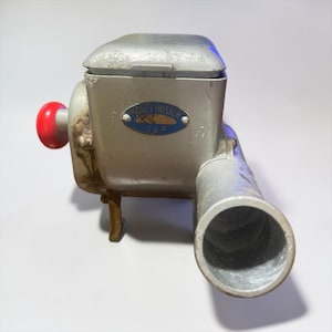 May include: A set of three ceramic mugs with a speckled, matte finish. The mugs are in shades of cream, light gray, and dark gray. Each mug has a simple, minimalist design, perfect for coffee or tea.