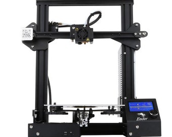 Könnte beinhalten: Schwarzer 3D-Drucker mit einem blauen LCD-Bildschirm, auf dem "Ender" steht. Der Drucker hat einen schwarzen Rahmen und einen weißen Filament-Spulenhalter.