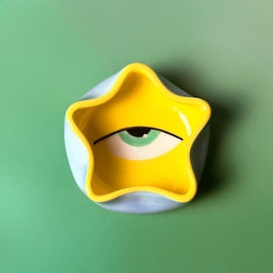 Star shaped ceramic trinket dish with hand-painted eye