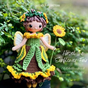 May include: Crochet doll pattern for Hazel the Sunflower Fairy. The doll is wearing a green and brown dress with yellow sunflower accents. The doll has brown hair and a sunflower crown.