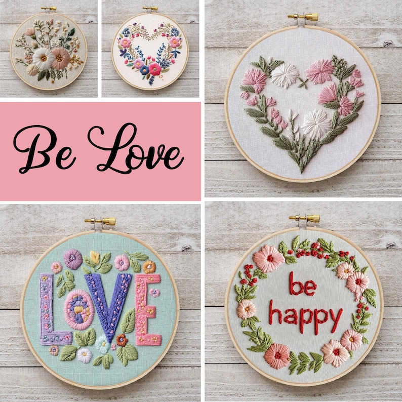 May include: Four embroidery hoops with floral designs. The hoops are on a white wooden background. The designs include a heart with flowers, the word "LOVE" with flowers, a wreath with the words "be happy", and a heart with flowers.