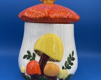 VTG grote 12-inch Arnels koektrommel met paddenstoelen, oranje gespikkeld geel