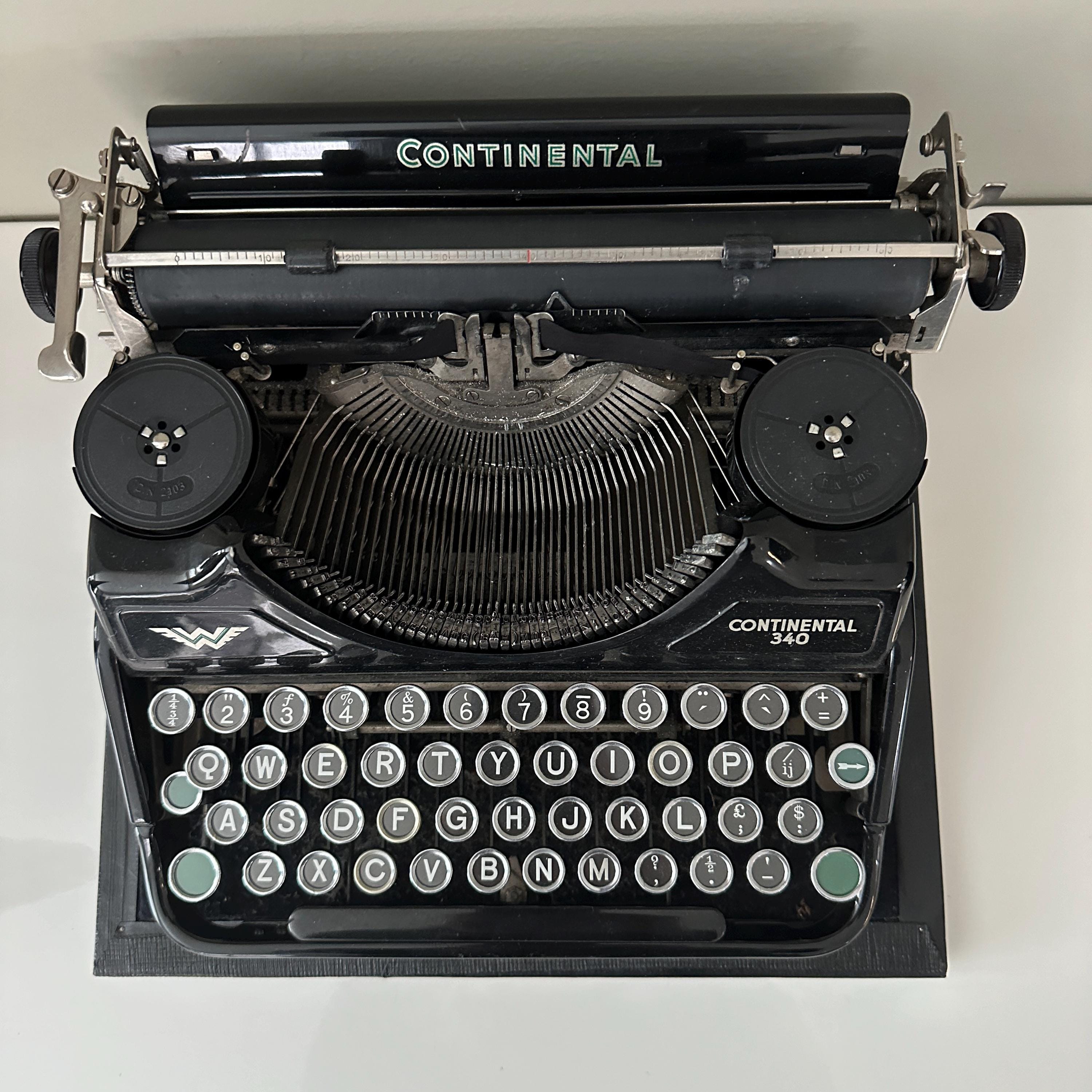 Continental 340 Portable Typewriter, Working, Glossy Black Continental 340 Portable Typewriter, Working, Glossy Black