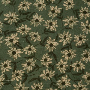 Peut inclure: Gros plan sur un tissu vert avec un motif r&eacute;p&eacute;t&eacute; de marguerites blanches avec des centres et des tiges brun fonc&eacute;. Le mot "TEXTILE" est imprim&eacute; en blanc en bas &agrave; droite.