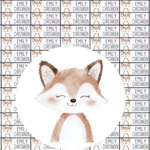 May include: A repeating pattern of fox illustrations and name tags that read "EMILY CHRISTIANSEN". A watercolor illustration of a smiling fox is in the center. The fox is brown and white.