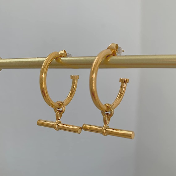 Titan gold earrings store
