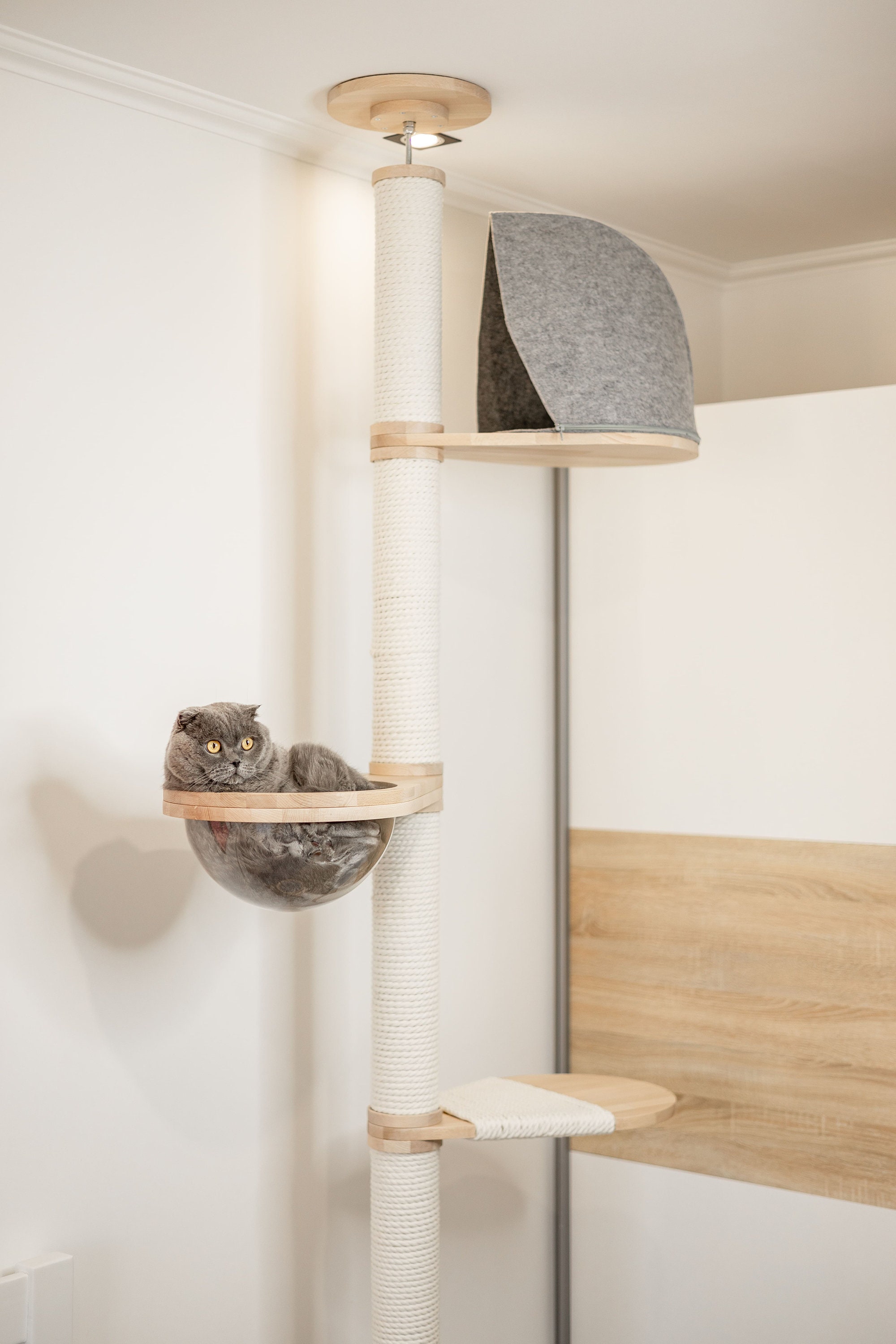 Tension pole top cat tree