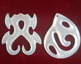 2 Antique, hand Carved mother of pearl  Pendants.