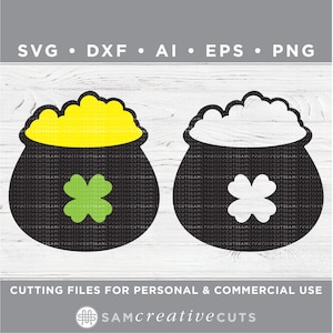 May include: Two black silhouette pots with a shamrock design. One pot is filled with gold coins and the other with white coins. The pots are on a woodgrain background.