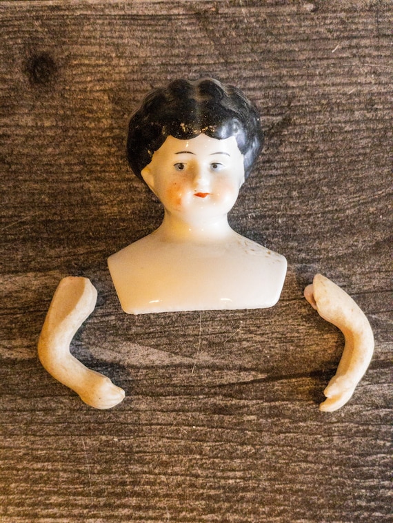 Antique German Porcelain Doll Head and Arms – 2" Low Brow, Black Hair