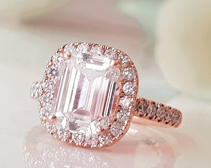 2.50 Carat Emerald Cut IGI Certified CVD Lab Grown Diamond set in a Rose gold diamond pave halo Setting
