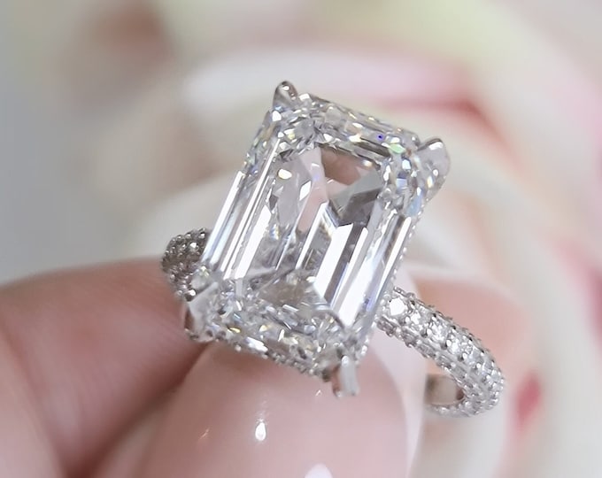 This dainty elegant pave diamond setting features a 6 carat IGI certified CVD lab grown emerald cut diamond & 0.75 carats accent diamonds