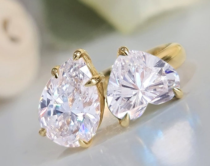 This stunning unique Toi Et Moi Ring features a 2 carat teardrop diamond & 2 carat heart shape IGI certified CVD lab grown diamond