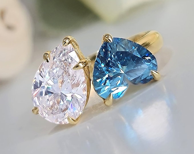 This stunning unique Toi Et Moi Ring features a 2 carat teardrop diamond & 2 carat heart shape IGI certified CVD lab grown diamond