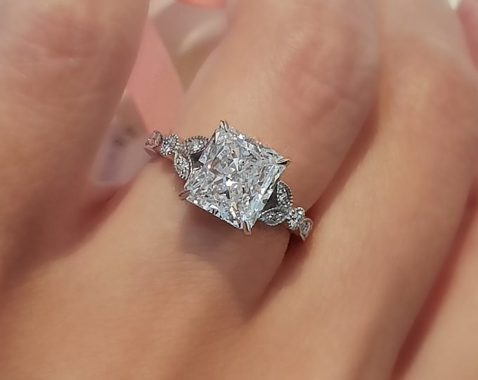 This Vintage Style setting with milgrain finish features a 3 Carat Radiant Cut IGI Certified CVD Diamond
