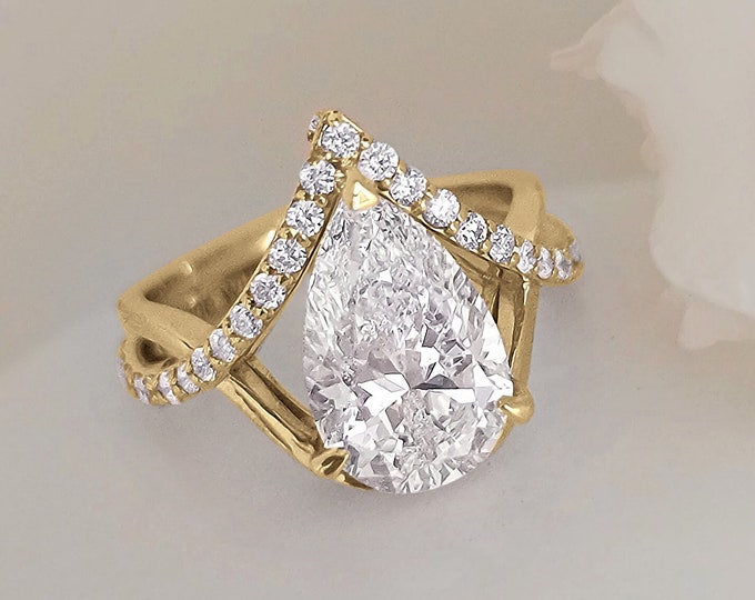 Unique 3 Carat IGI Certified CVD lab grown Teardrop Diamond set in a freeform 0.50ct yellow gold diamond setting