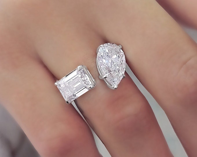 This stunning unique Toi Et Moi Ring features a 3 carat teardrop & 3 carat emerald cut  IGI certified CVD lab grown diamonds
