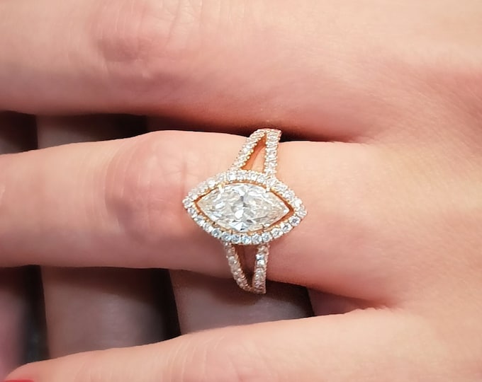 This unique Victorian style diamond split shank & halo 14K rose gold setting features a 2 carat IGI certified CVD lab grown marquise cut diamond