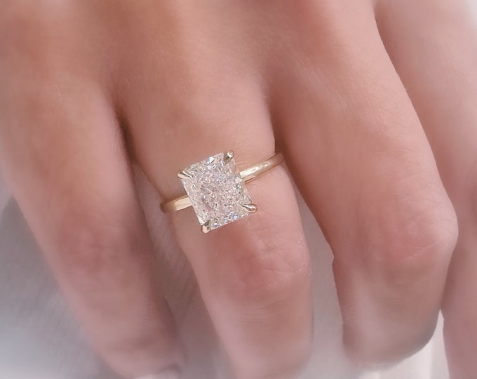Shine Bright With One-Of-A-Kind Handcrafted 14 Karat Yellow Gold classic solitaire 3 Carat IGI certified CVD Lab Grown Radiant Cut Diamond ring