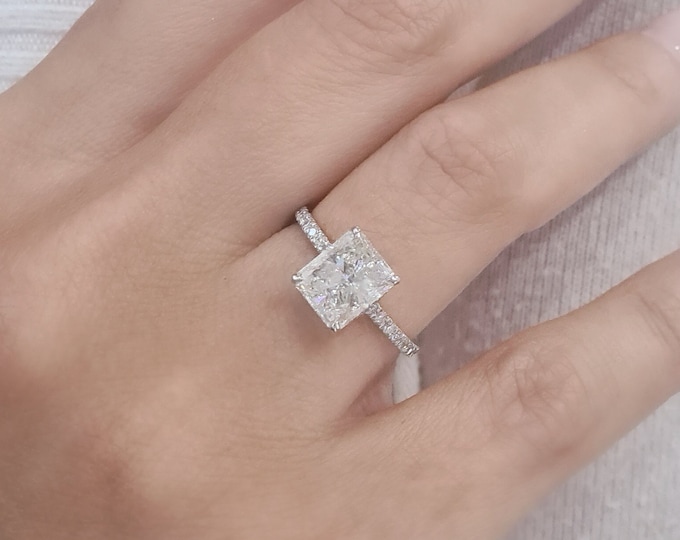IGI certified 2 Carat Radiant Cut CVD lab grown diamond set in a classic low profile hidden halo diamond pave setting
