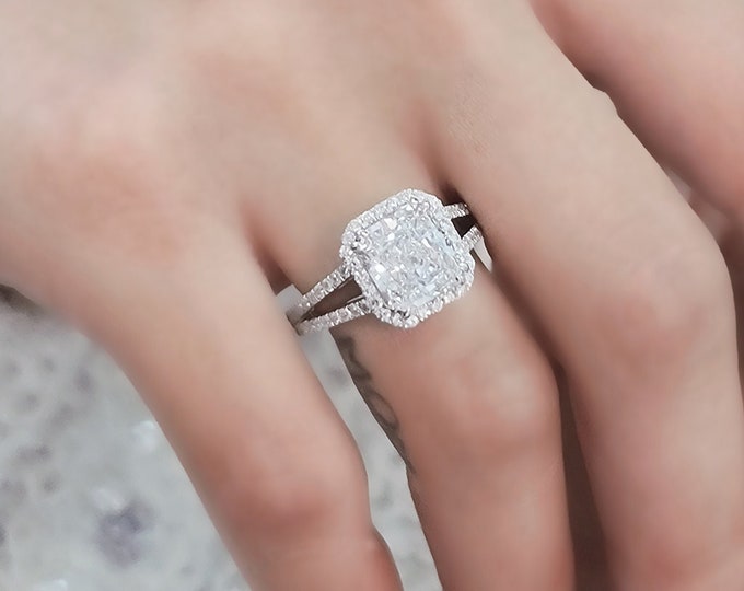 This stunning split shank diamond halo setting features a 3 carat radiant cut IGI certified CVD lab grown diamond set with 0.85 carat pave set diamonds