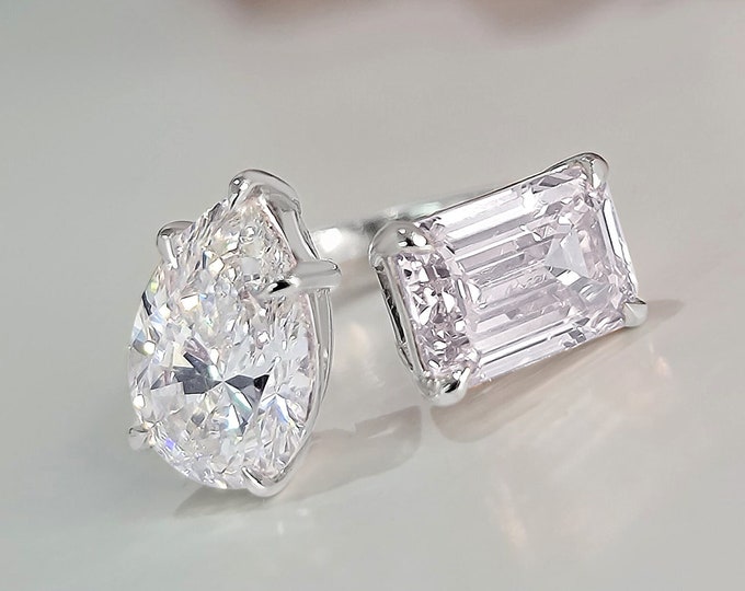This stunning unique Toi Et Moi Ring features a 3 carat teardrop & 3 carat emerald cut  IGI certified CVD lab grown diamonds
